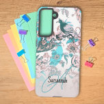 Funda Para Samsung Galaxy S21 Monograma de pájaro azul rosa y patrón floral<br><div class="desc">Este diseño presenta un diseño de pájaro rosa y azul y de motivos florales. El texto de la plantilla ofrece la oportunidad de un nombre, monograma o ambos. Personalice los campos de texto, elimine cualquier texto o edite utilizando la herramienta de diseño para seleccionar el estilo de fuente, el tamaño...</div>