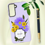 Funda Para Samsung Galaxy S21 Personalizado Monograma Bonito Flores silvestres<br><div class="desc">Este diseño presenta fotos de flores silvestres moradas y amarillas mezcladas con la vegetación del arte digital. Incluye plantillas para la letra inicial y el nombre en un bloque de esquina con recorte blanco. Personalice el texto, elimine un elemento de texto o edite utilizando la herramienta de diseño para seleccionar...</div>