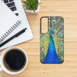 Funda Para Samsung Galaxy S22 Pluma de plumas de pavo real azul<br><div class="desc">Proteja su teléfono Samsung Galaxy S22 con este estuche de teléfono de moda que presenta la imagen de una hermosa Peacock azul con plumas coloridas. Seleccione su estilo de teléfono. Para otras marcas de teléfono, necesitará un funda personalizar para rellenar la imagen en los bordes de la plantilla de diseño....</div>