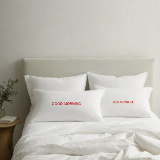 Fundas de almohada con texto rojo 'Buenos días' y 