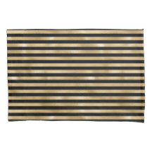 Fundas de almohada rayadas en negro y dorado