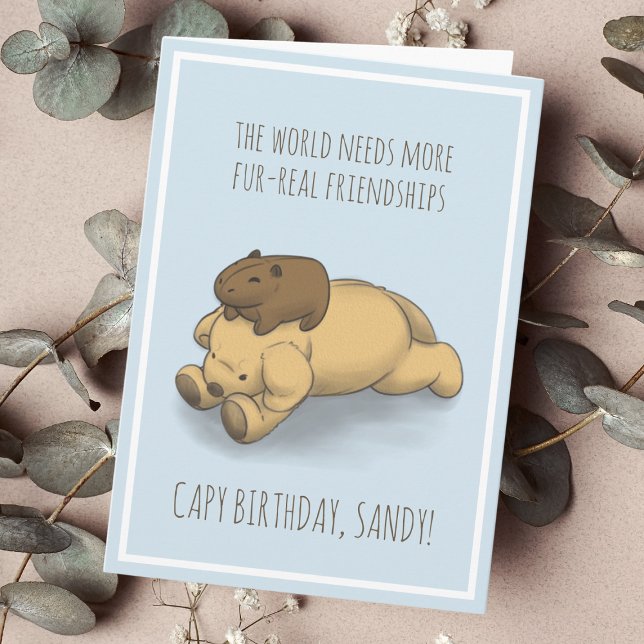 Funny Capybara y la tarjeta de cumpleaños Dog Pun (Send birthday wishes that are as adorable as a capybara and a puppy with this charming card.)