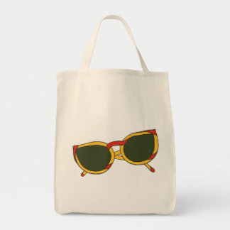 Gafas de sol en amarillo y rojo en las bolsas de t