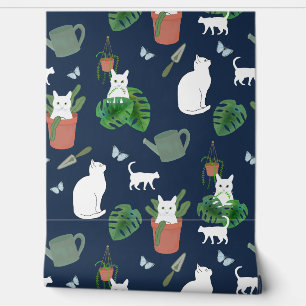 Gardening Gats White Kitty y Plantas en la pared a