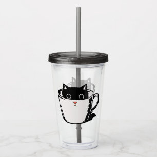 Gatito negro con nariz roja escondido en una taza