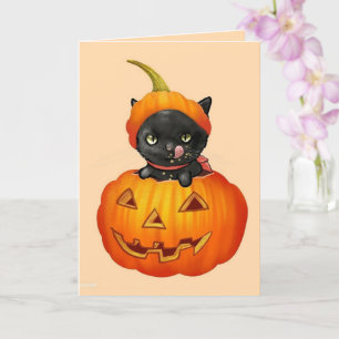 Gatito negro en la tarjeta Halloween de calabaza