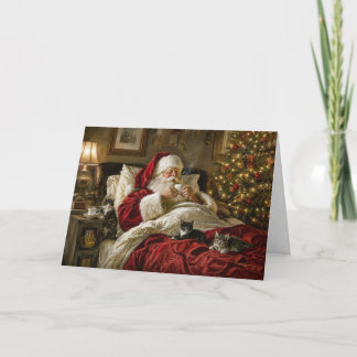 Gatitos de Navidad junto al árbol