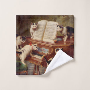 Gatitos y piano