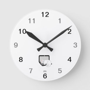 Gato blanco durmiendo en el reloj de pared acrílic
