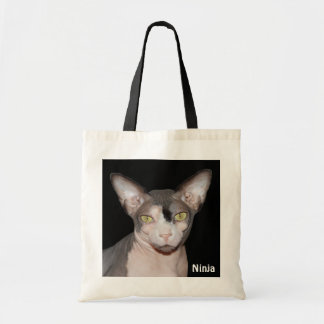 Gato blanco y negro del bolso el | Sphynx