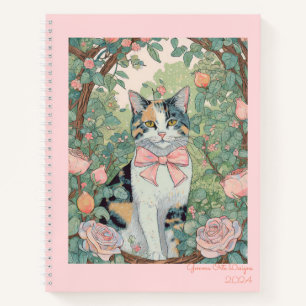 gato calico en cuaderno en espiral de jardín