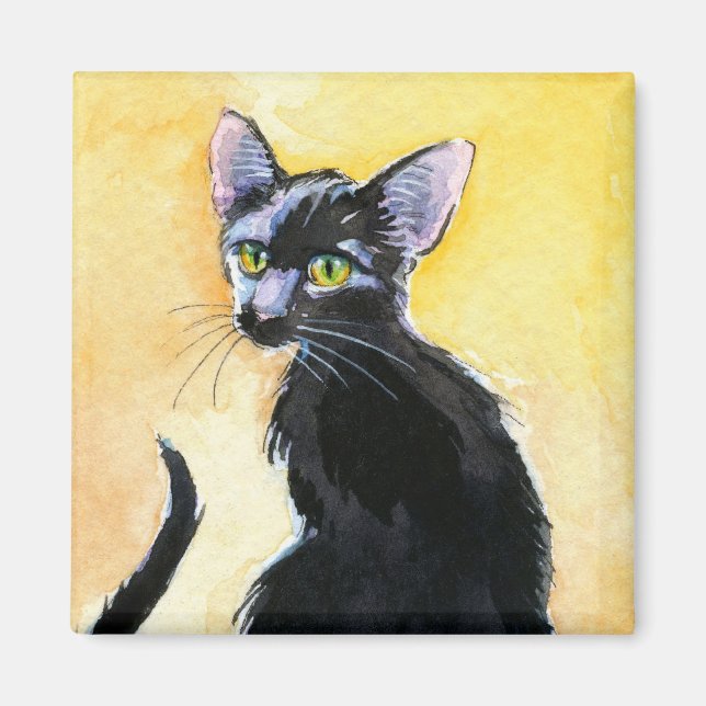 Gato de gatito negro, imán naranja y amarillo
