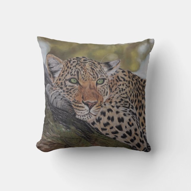 Gato de leopardo que miente en una almohada del (Anverso)