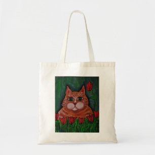 Gato de Tabby y la bolsa de asas anaranjados