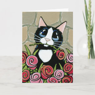 Gato de Tuxedo con tarjeta de felicitación de rosa