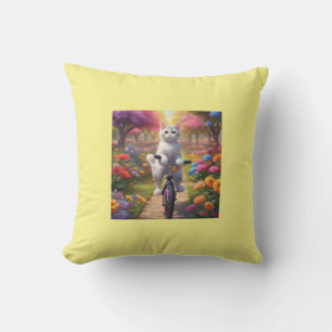 Gato en bicicleta en almohada colorida de flores