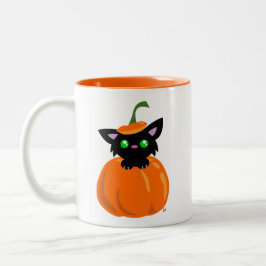 Gato en la taza de café de la calabaza