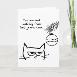 Gato enojado y el árbol de Navidad