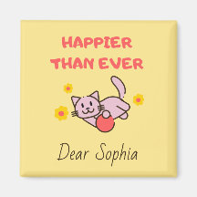 Gato feliz amarillo con imán de flores