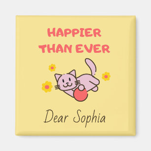 Gato feliz amarillo con imán de flores