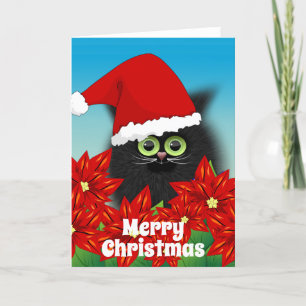 Gato navidad en Santa Hat en medio de la Poinsetti