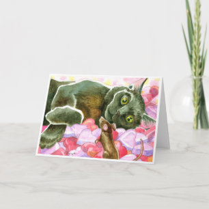 Gato negro con los corazones de la tarjeta del día