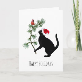 Gato negro con pájaro rojo en tarjeta de Navidades