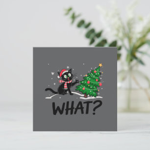 Gato negro divertido empujando árbol de Navidad ¿Q