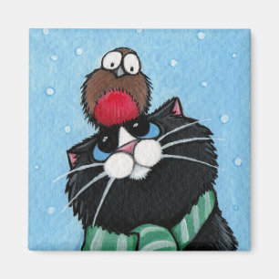 Gato negro e imán festivo del petirrojo