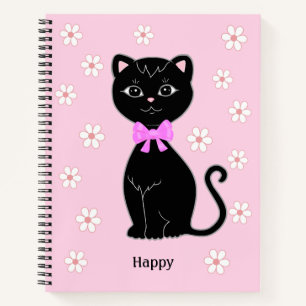 Gato negro lindo y flores en libreta rosa claro
