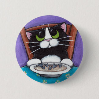 Gato que come el botón de la sopa