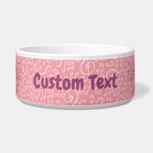 Gato rosa con cuenco de violín