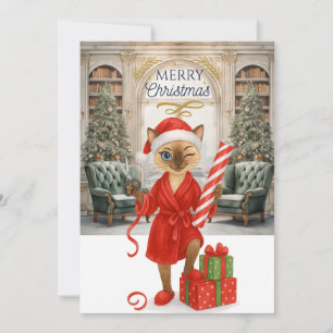 Gato siamés sostiene regalos de Navidad