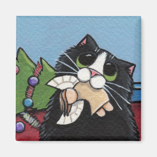 Gato travieso en el imán de los Navidades