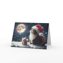 Gato y ratón observando la tarjeta de Navidades de