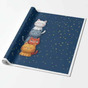 Gatos adorables apilados en papel de regalo azul m