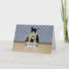 Gatos con una tarjeta de felicitación para el gran