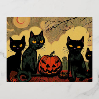 Gatos de Halloween negros con tarjeta de calabaza