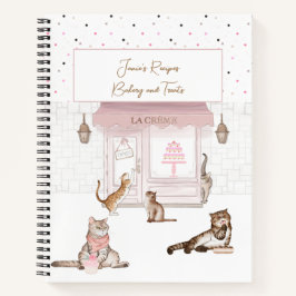 Gatos divertidos en un libro de recetas de panader