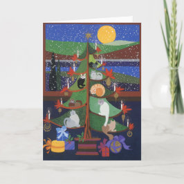 Gatos en el árbol de Navidad