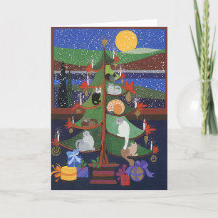Gatos en el árbol de Navidad