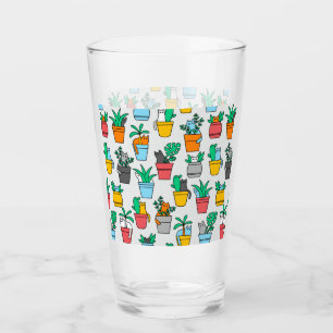 Gatos en macetas de flores