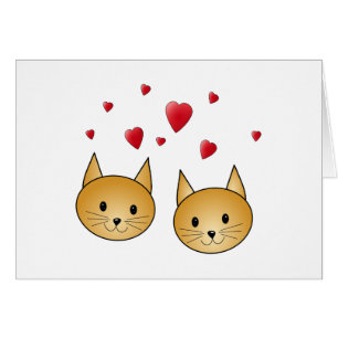 Gatos lindos del jengibre. Con los corazones rojos