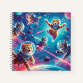 ¡Gatos locos en cuaderno espacial!