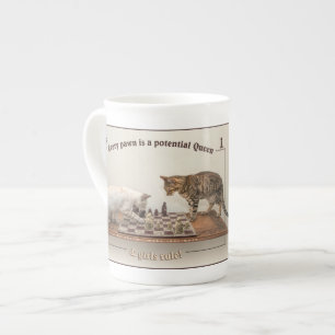 Gatos que juegan a ajedrez en una taza de China