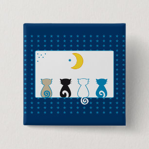 Gatos que miran el botón de la luna