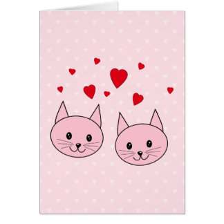 Gatos rosados con los corazones del amor