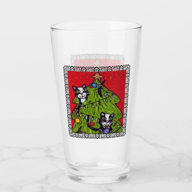 Gatos traviesos trepando el marco negro del árbol  (Anverso)