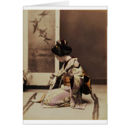 Geisha japonesa tocando el shamisen