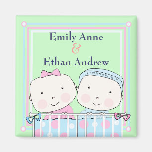 Gemelos en imán del bebé del pesebre, del chica 